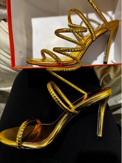 Spiral gold heels