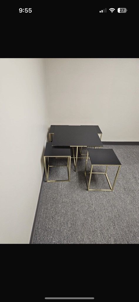 Glass tables, five tables from smallest to largest, $100.
