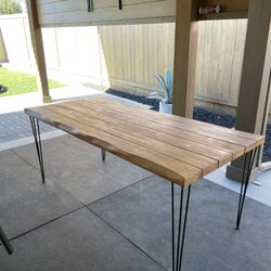 Wood table with hairpin legs, (6’ x 3’, 30” height), with rubber footpads. Already Disassembled.  In good condition.