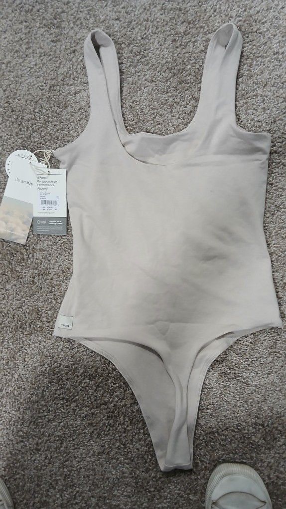 Woman's Body Suit And Women's Shorts
