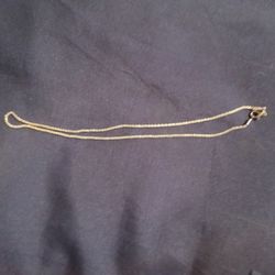 Silver Necklace With A Silver Pendant 