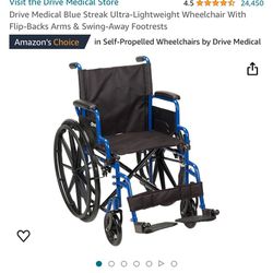Drive Medical Blue And Black Wheelchair With Flips-Backs Arms & Swing-Away Footrests