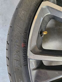 2023 19" PRIUS LIMITED OEM RIM AND TIRE 195 50 R19