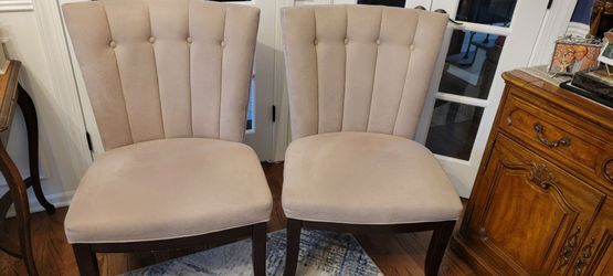 Two formal chairs