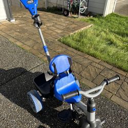 Tricycle with handle. Toddler bike