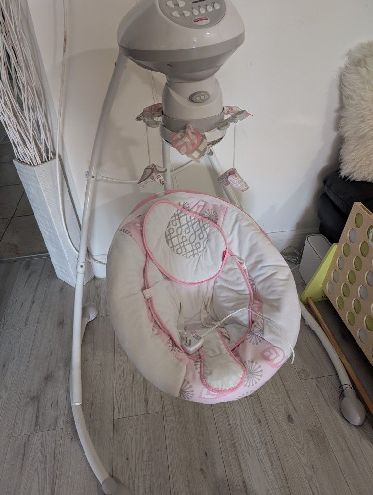 Baby Fisher-Price Revolve Swing.
