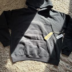 black essentials fear of God hoodies