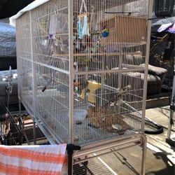 Parakeet cage with everything