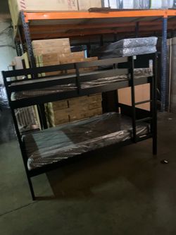Twin over twin bunk bed. White or espresso. Assembly required. Assembly not included. Taxes included. Free delivery.  Bunk Bed only without Assembly-$