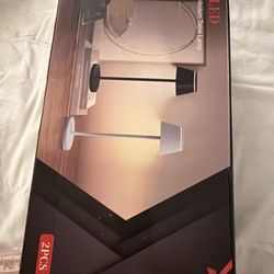 Two Lamps In A Black And White Color.