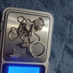 White Gold Necklace Is 14k. The Pendant The Earing And The Ring Is 10k Ring Is Size 7