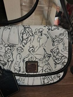 Fairly new limited edition peter pan dooney& bourke purse
