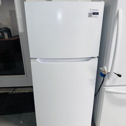 New Frigidaire white refrigerator 28X60X29 with a 60-day warranty on a receipt