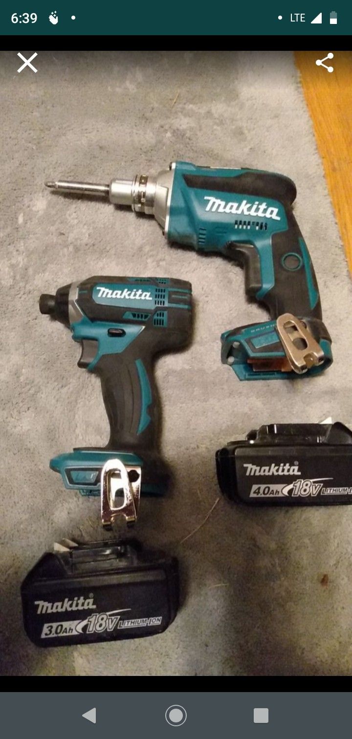 Two Makita hammer drill and impact