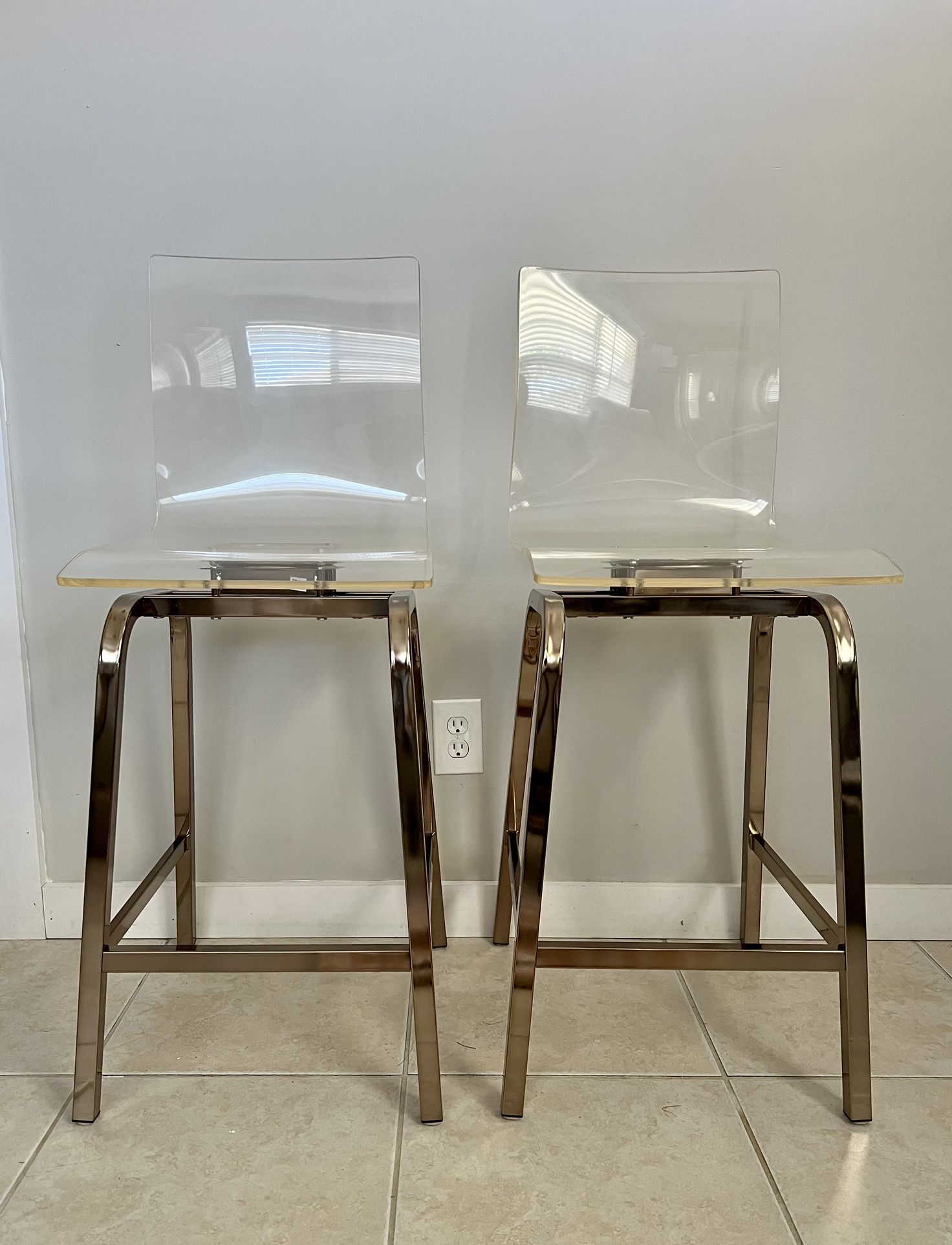 HomeSullivan Acrylic & Gold Swivel Chairs