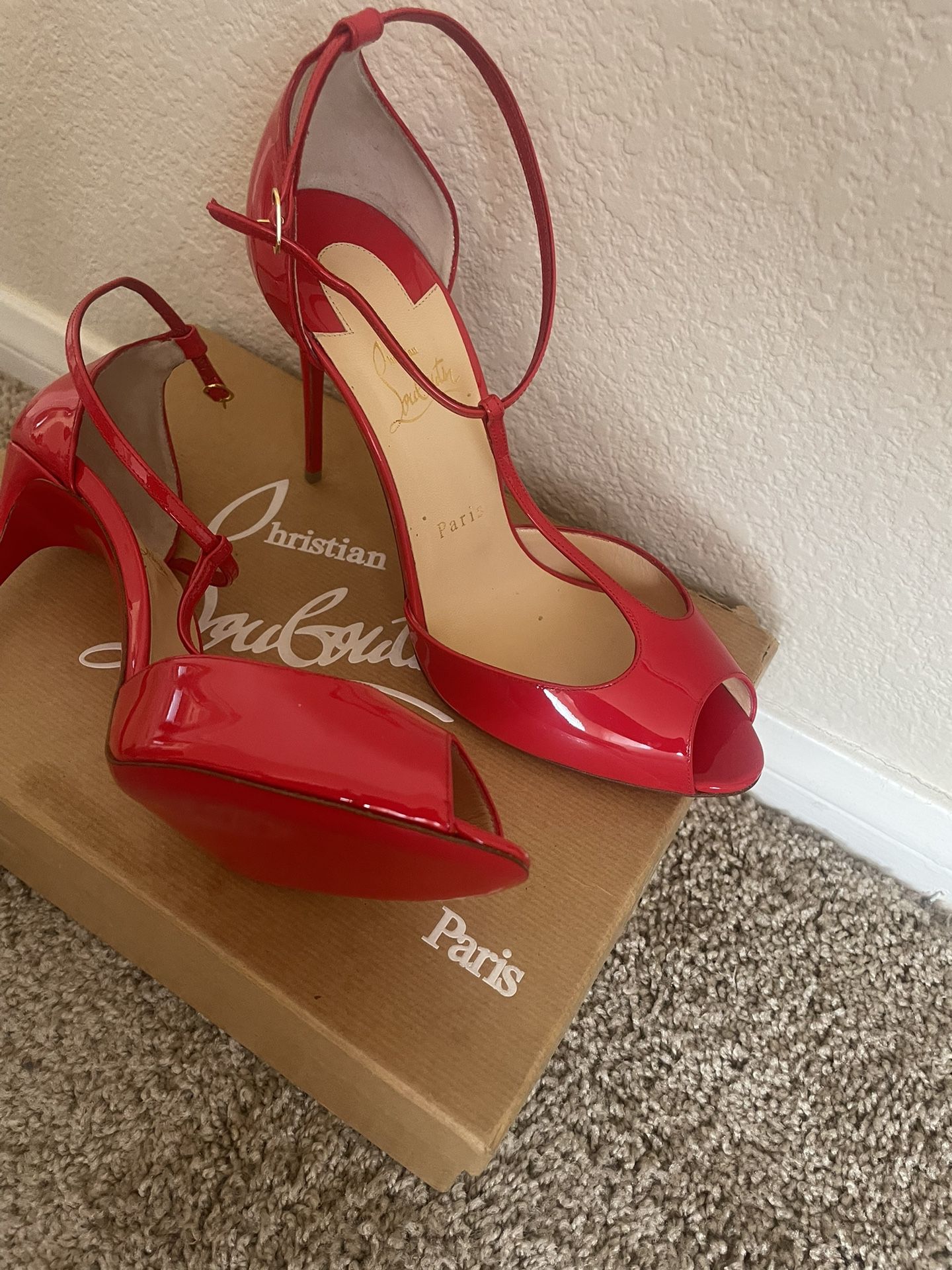 christian louboutin (Red Bottoms)