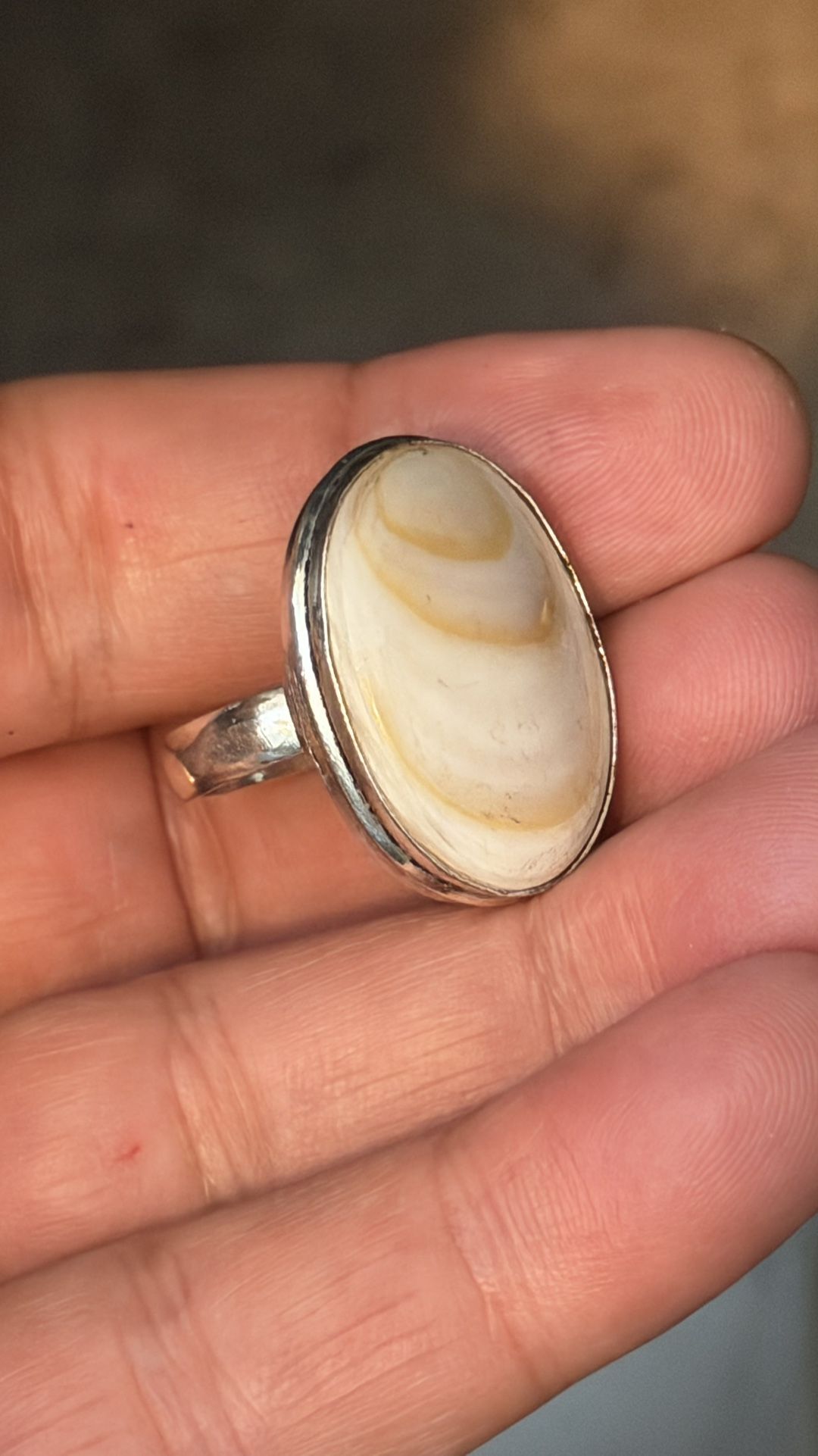 Sterling Silver Ring With A Bright Cold Stripes Mother Of Pearls Gemstone