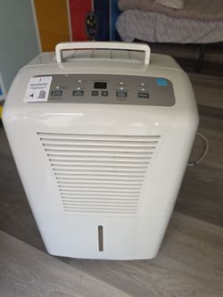 GE 70-Pint Dehumidifier with Built-In Pump - $100 OBO