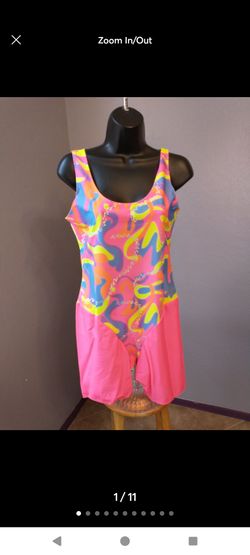 Barbie InSpirit Designs Neon Unitard Size Large

Vibrant neon pink unitard with a multicolored swirl pattern. This garment is an adult size Large (12-
