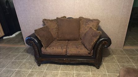 Traditional Loveseat with Carved Wood Frame