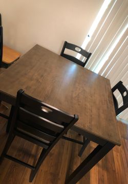 High Kitchen table. Brand new. 4 chairs.