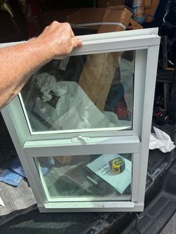 Two single hung PGT windows, aluminum white 25 3/8 x 25, 29 x 19