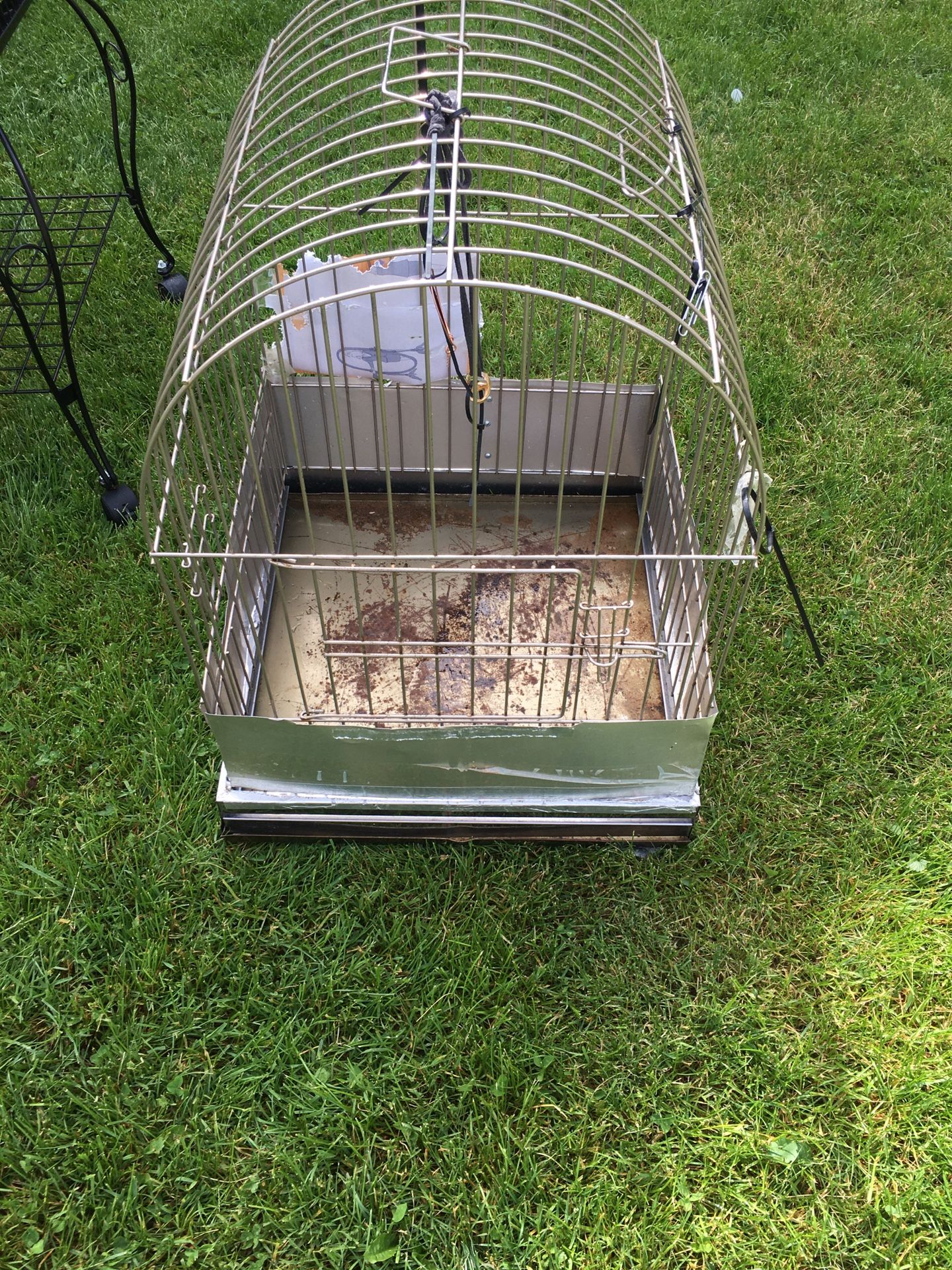 Bird Cage has a opening on the sides for a bird mating box