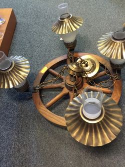 Crafted antique wheel chandelier