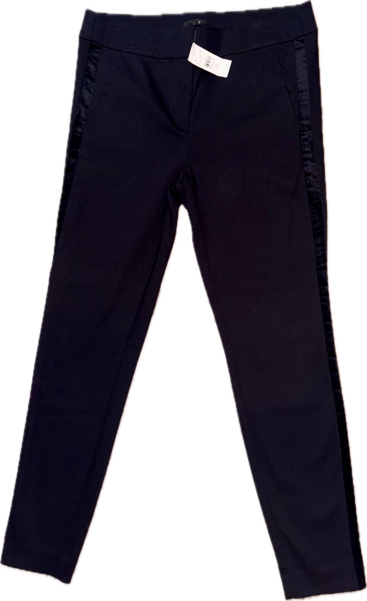 These LOFT Women's Marisa Pants in size 6 are sleek black dress trousers with a slim and straight leg fit. Made from a polyester-rayon-spandex blend, 