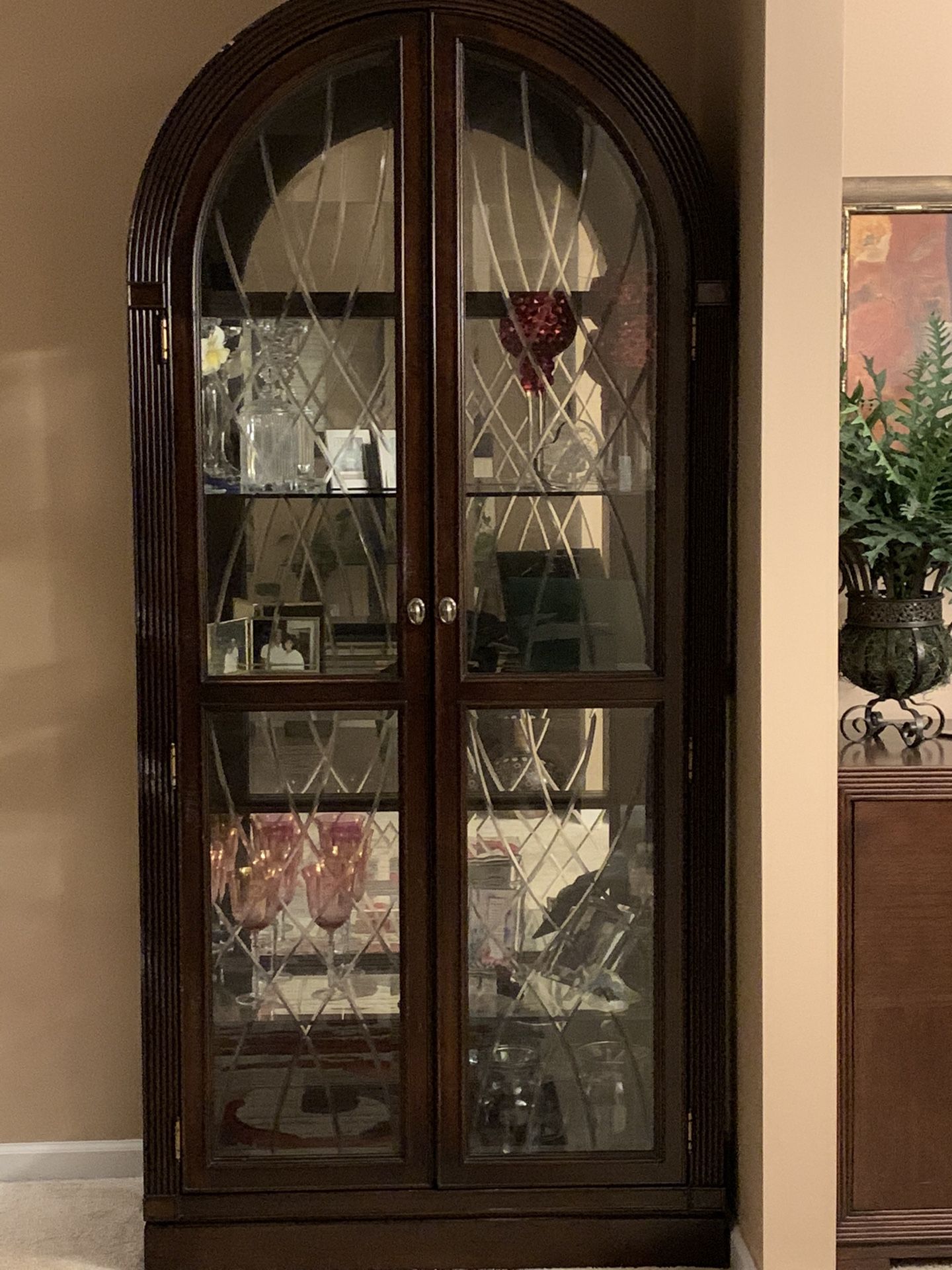 Curio cabinet with glass shelves