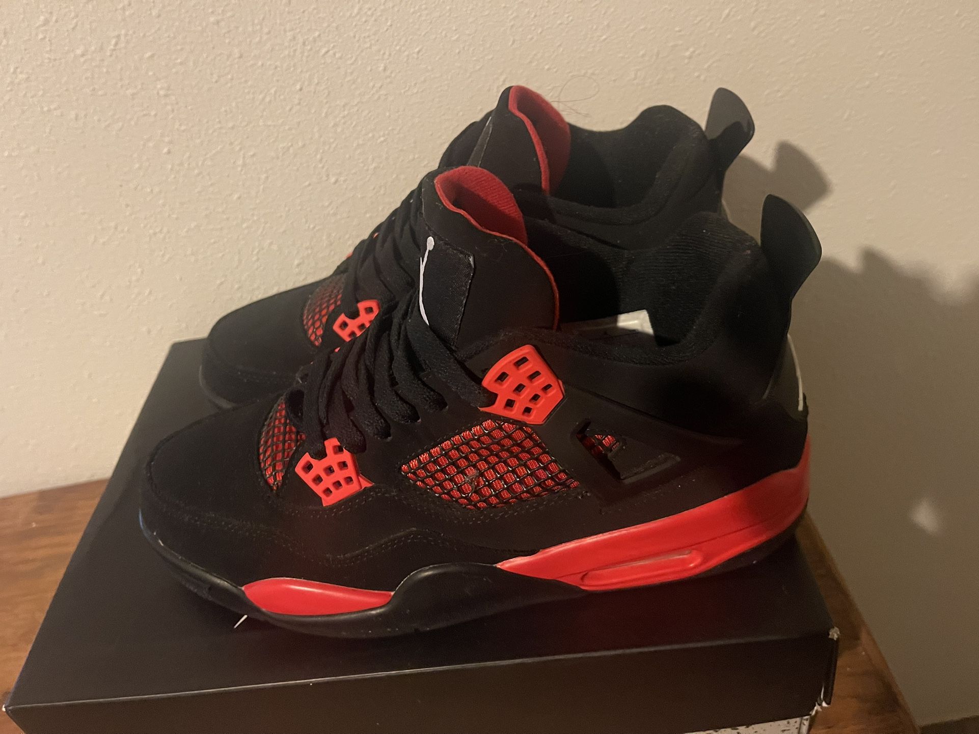 Air Jordan 4’s Red Thunders