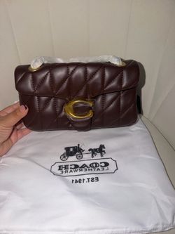 Brown quilted handbag