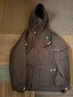 NIKITA women’s black snow jacket size large