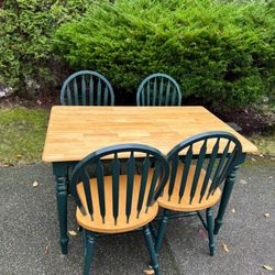 Wooden table and four chairs
