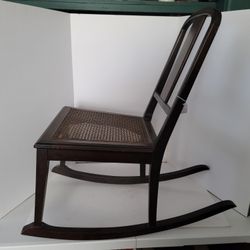 Antique Berkey & Gay Petite rocking chair with cane seat