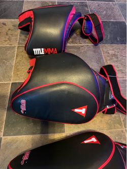 Title Boxing Gel Thai Style Hook and Loop Closure Thigh Pads - Black/Red