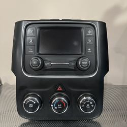 2015 Ram OEM Uconnect 5.0 W/satellite Radio, Hvac Controls, Remote Media Hub, And Radio Bezel