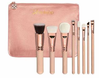 8pcs kabuki makeup brushes with bag . Set includes foundation bleeding eyeshadow and more.