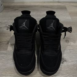 Black Cat Jordan 4s