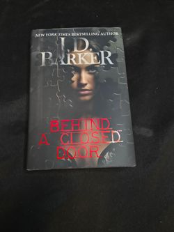 Behind a Closed Door Hardcover Book by JD Barker