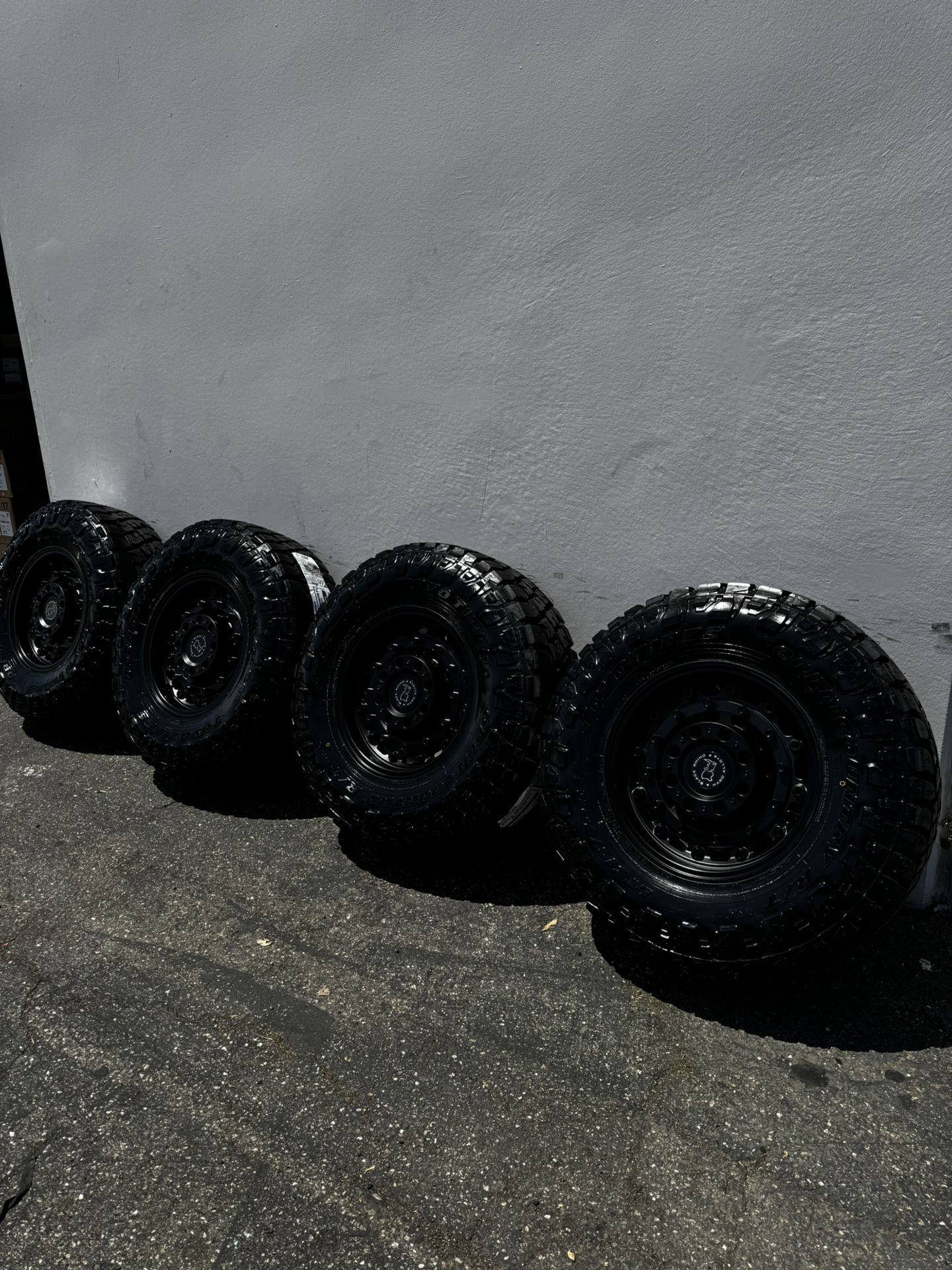 Black Rhino Arsenal 8x170 17” Wheels With 35” Toyo Open Country R/T PRO Tires