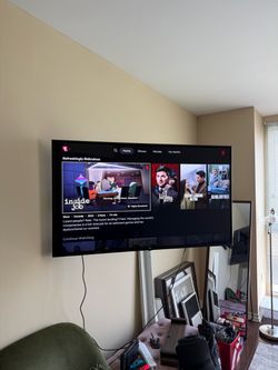 LG 55” 4K UHD Smart TV + Full-Motion Wall Mount & Remote