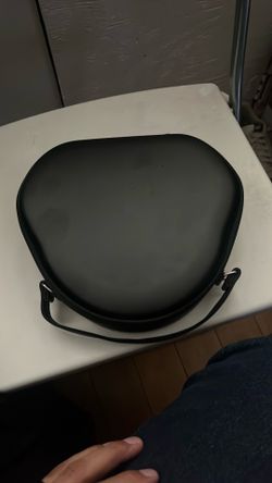 Black AirPods Max with protection case