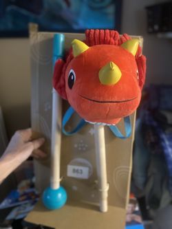 B. toys Orange Dinosaur Rocking Ride-On Toy with Sound Effects