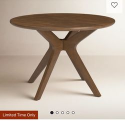 45” w x 29.75” tall round wooden table