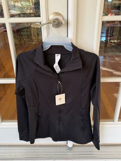 Brand New Never Worn Fabletics Trinity Performance Jacket. Size Small  Pet Free/Smoke Free Home