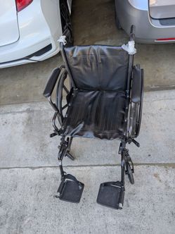 Folding Wheelchair with Footrests