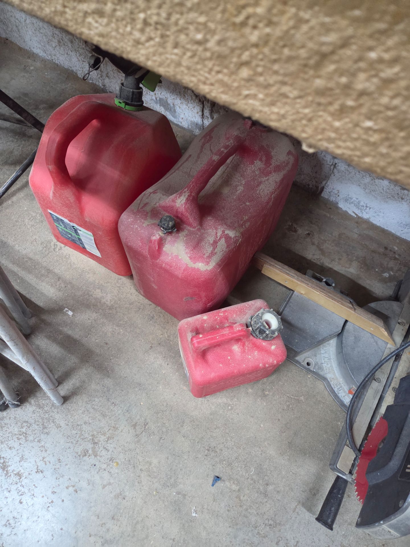 Gas cans, lug wrenches, roller stands