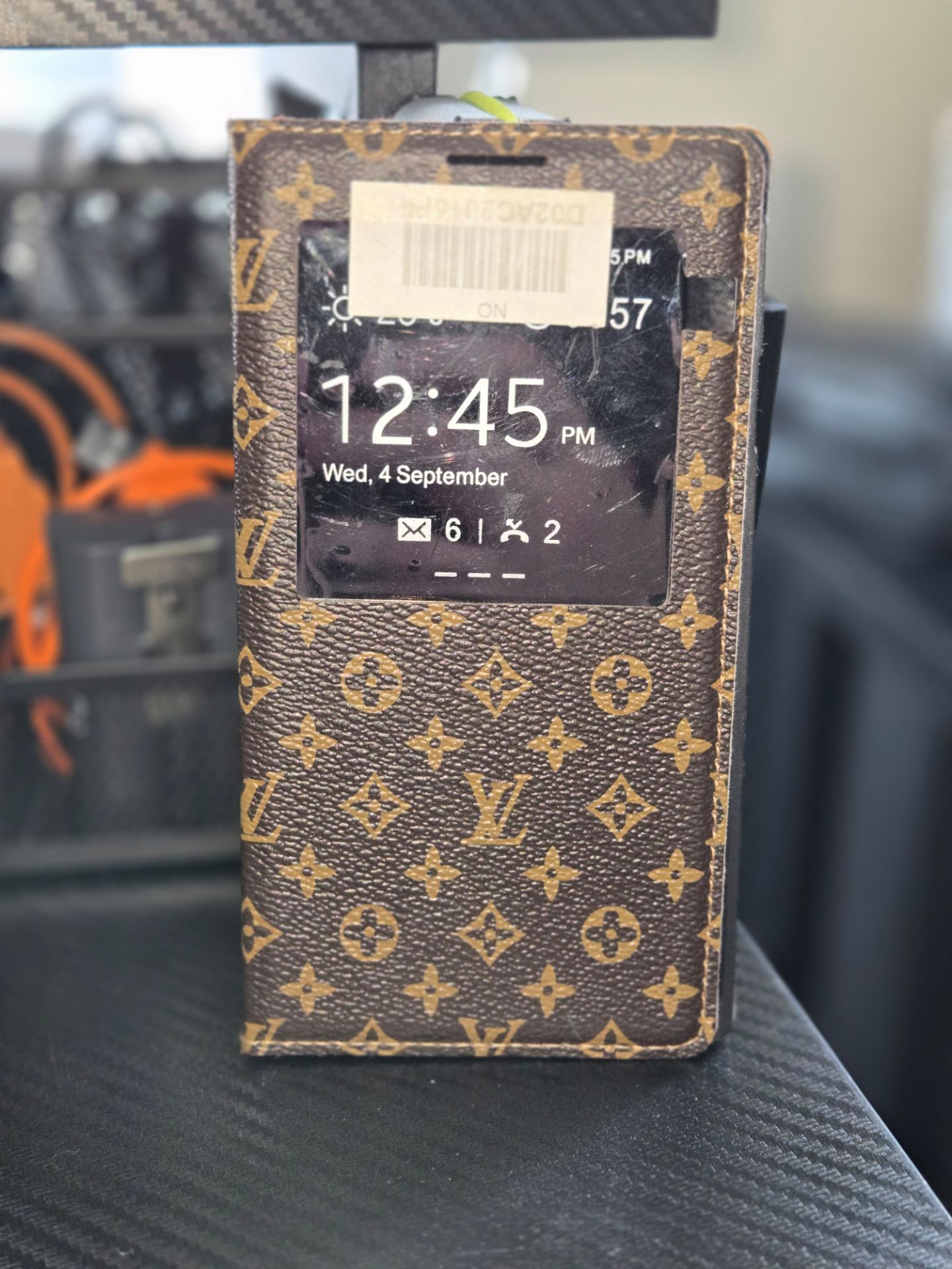 Authentic Louis Vuitton Brown Monogram Phone Case