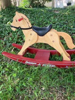 Wooden radio flyer rocking horse.  Cash only.